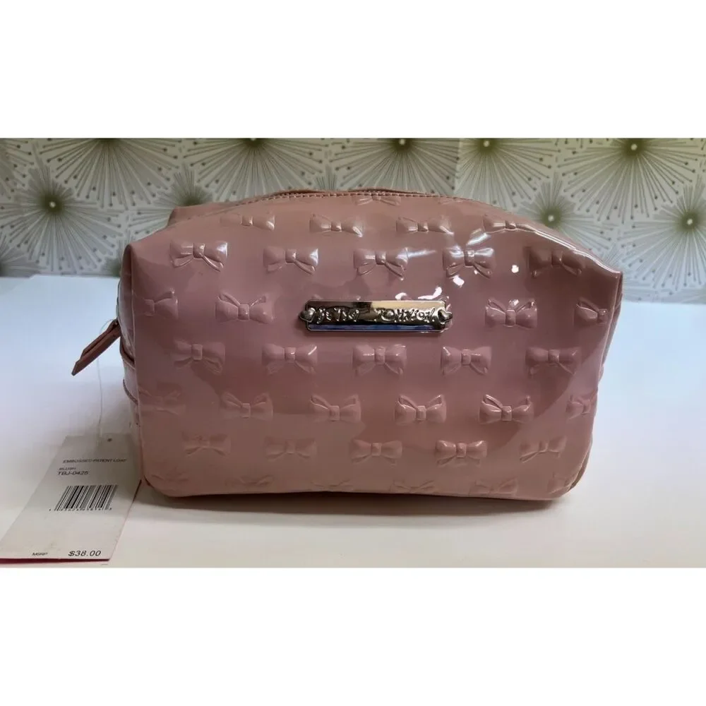 Betsey Johnson embossed patent travel/cosmetic bag in blush pink. NWT.